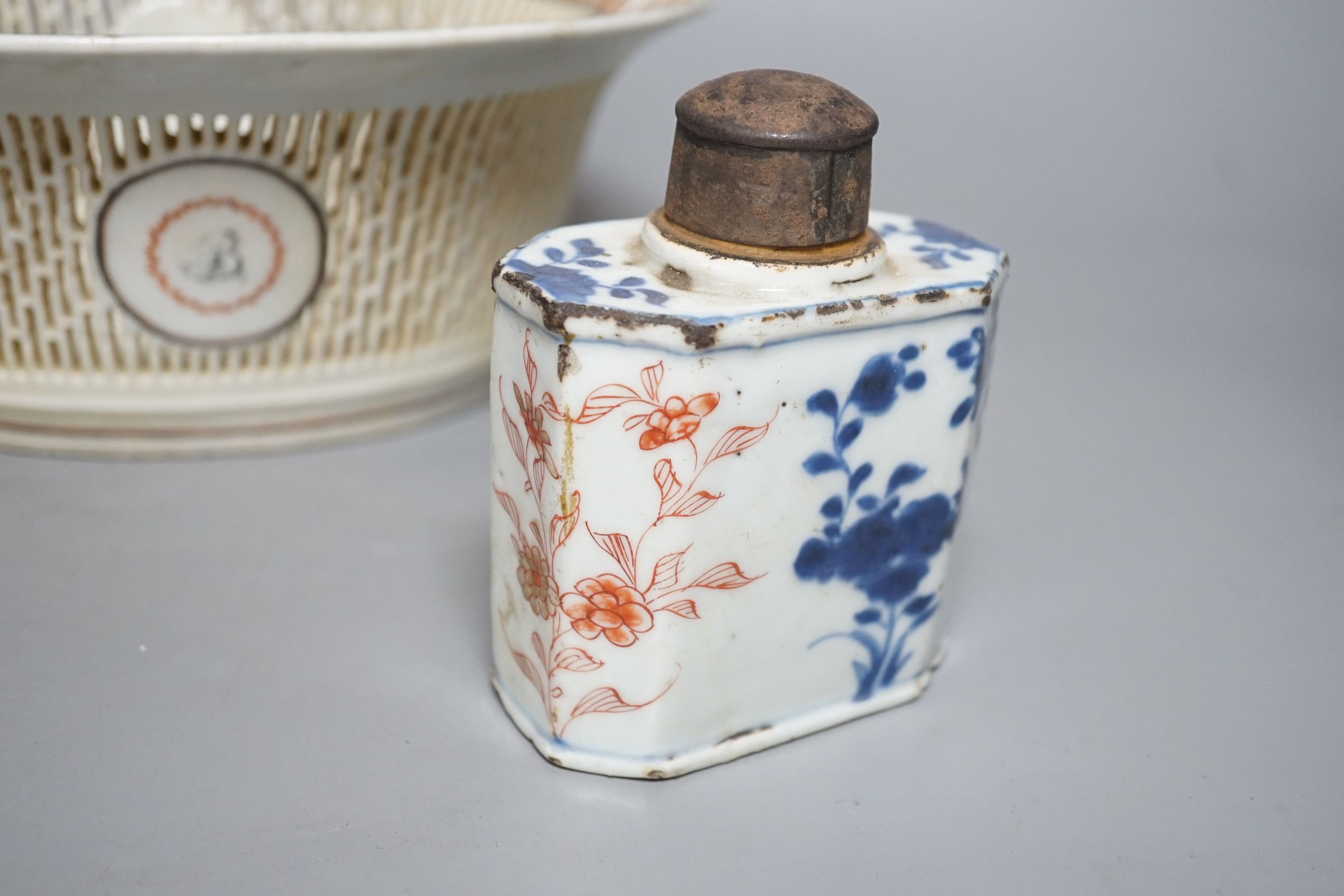 A late 18th century Chinese export famille rose chestnut basket, 27cm long, and a Chinese Imari tea caddy (2)